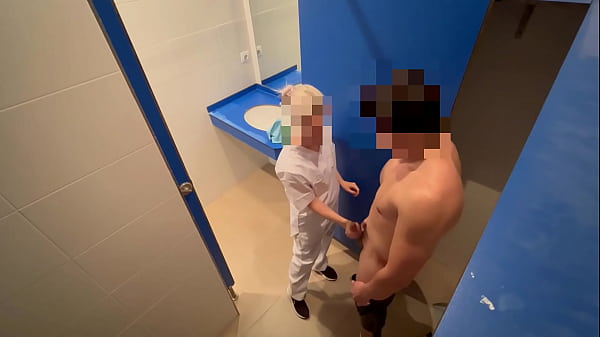 I surprise the gym cleaning_girl whowhen she comes_in to clean the_toilet she catches me jerking off and helps me finish cumming with a blowjob